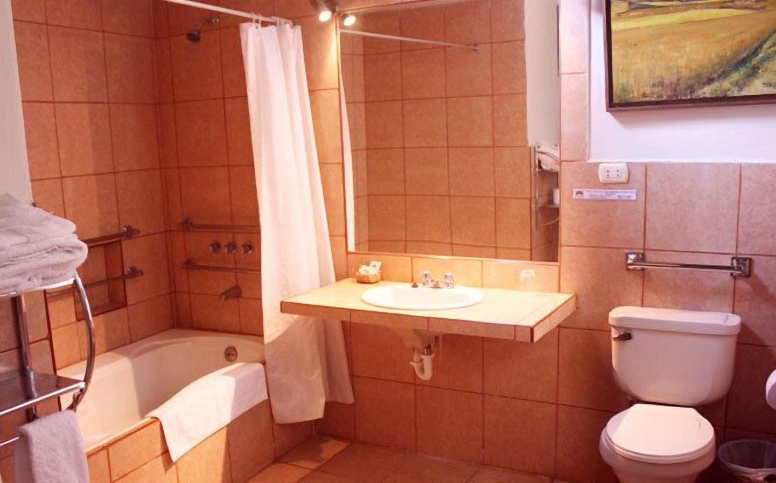 junior double room | bathroom | hair dryer, towels