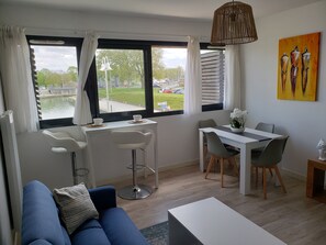 Apartment, 1 Bedroom | Living area | LCD TV