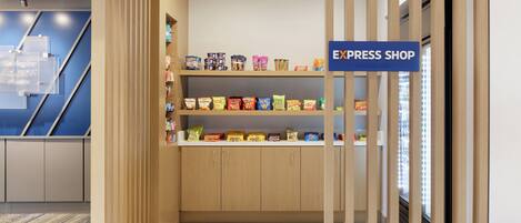 A hotel lobby with a wooden reception desk, a blue sign indicating an express shop, and shelves stocked with snacks.