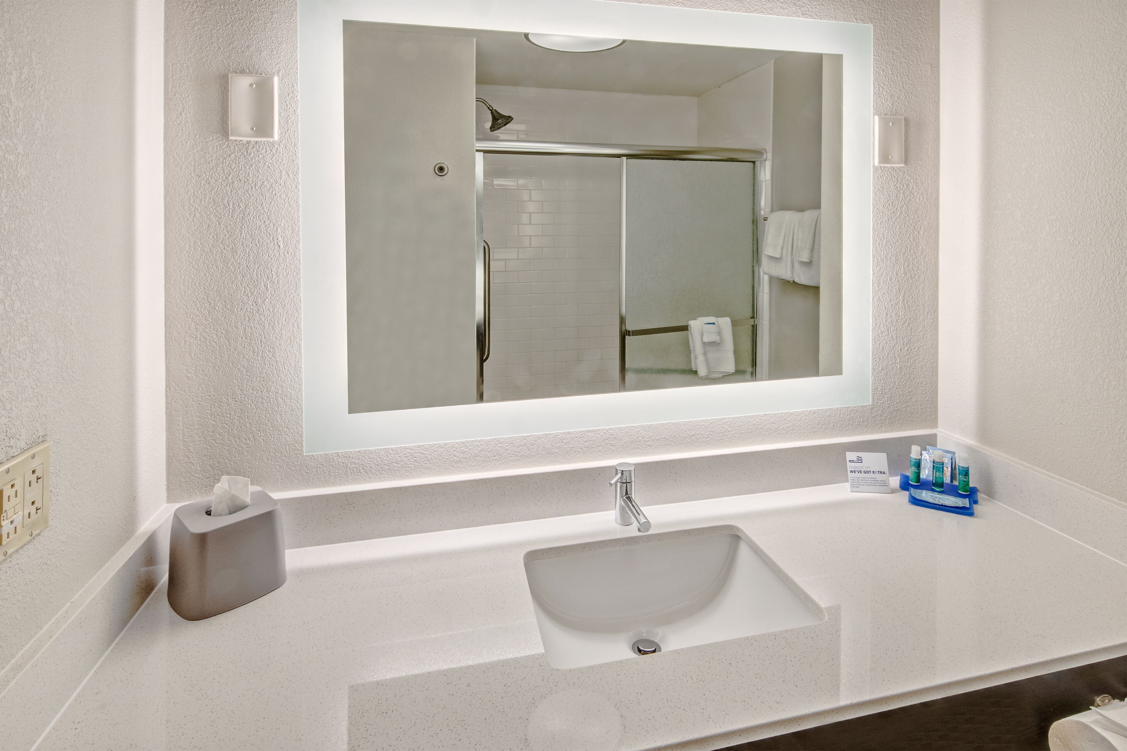 bathtub, hair dryer, towels