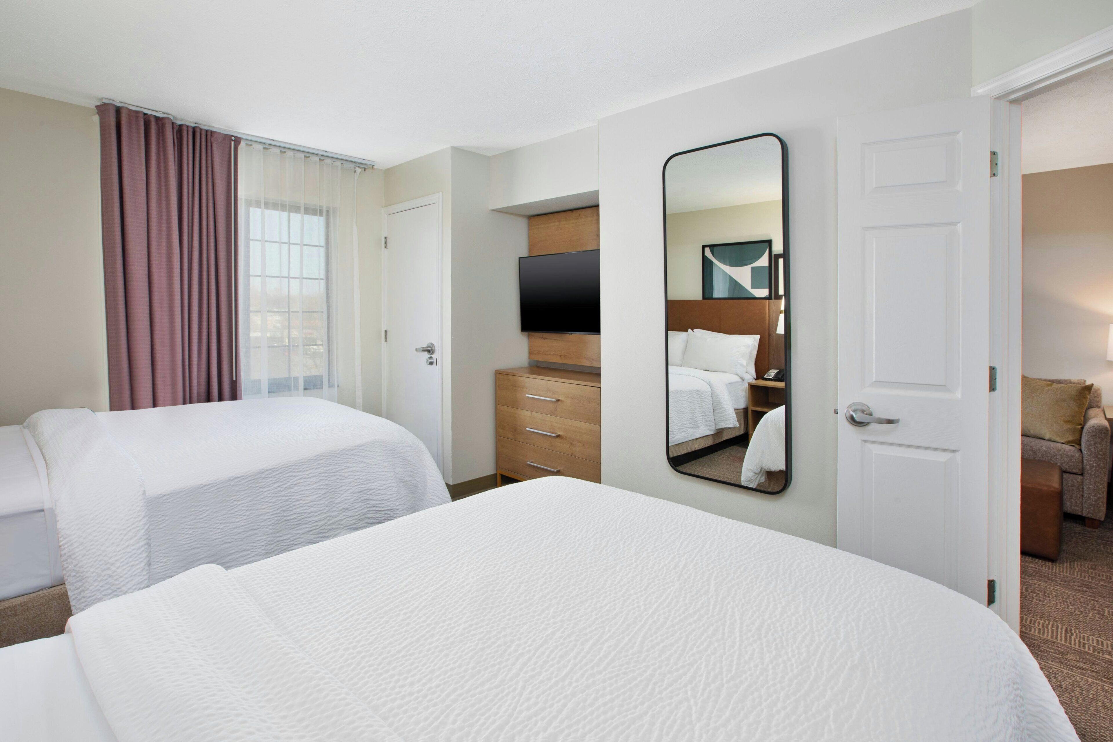 Premium bedding, down comforters, pillowtop beds, desk