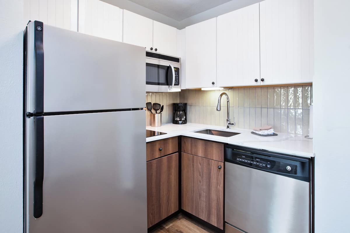 studio suite, 1 queen bed, kitchen | private kitchen | full-sized fridge, microwave, coffee/tea maker