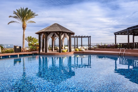 2 outdoor pools, pool umbrellas, sun loungers