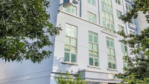 A modern hotel building with a prominent sign reading "HOTEL B1". - Hotel 81 Lucky (Singapore)