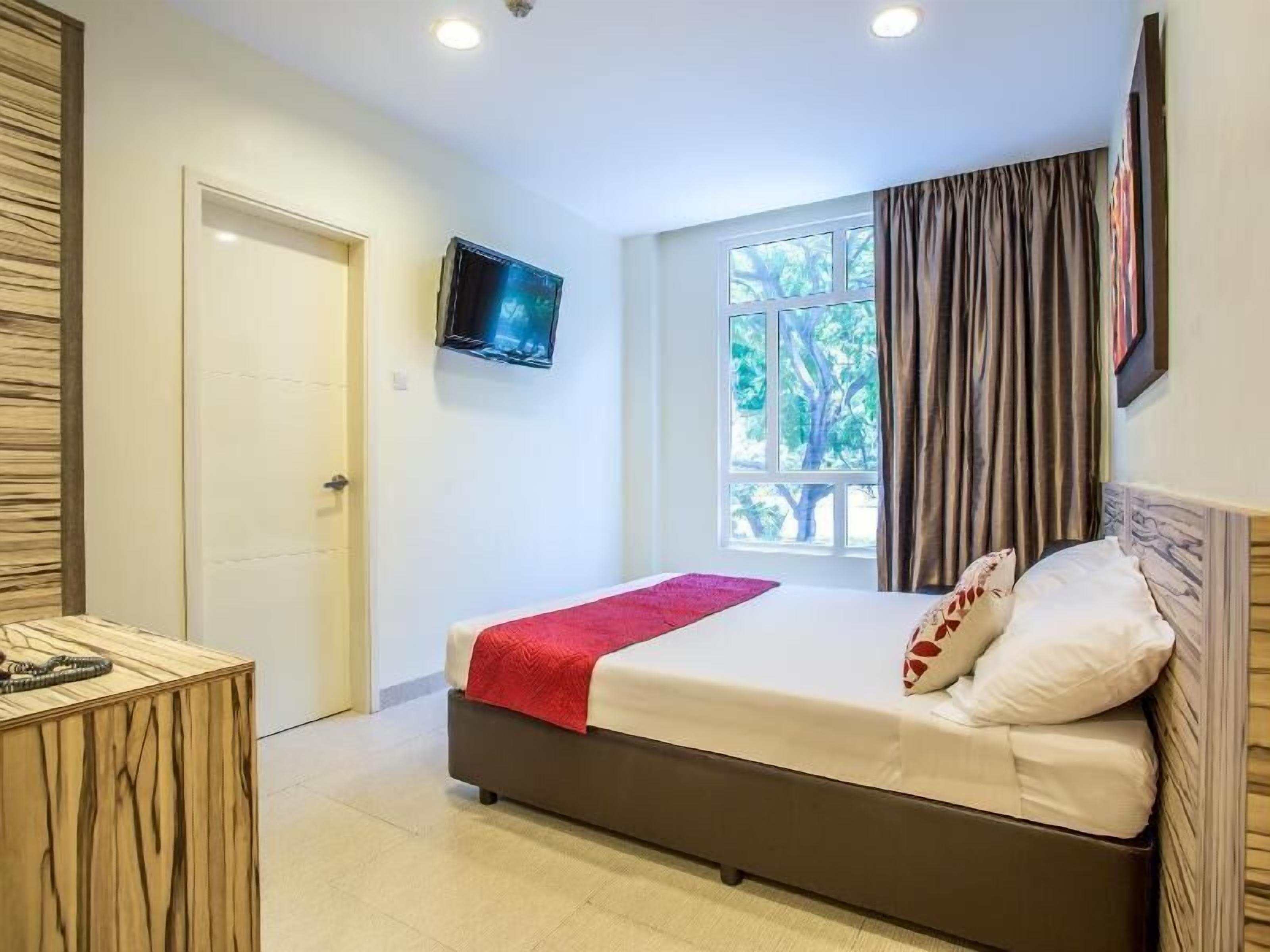 Desk, blackout curtains, free WiFi, bed sheets