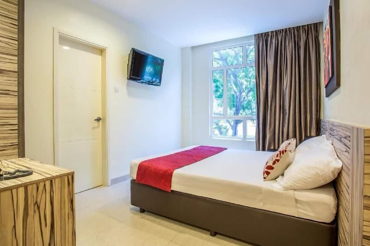 Desk, blackout curtains, free WiFi, bed sheets