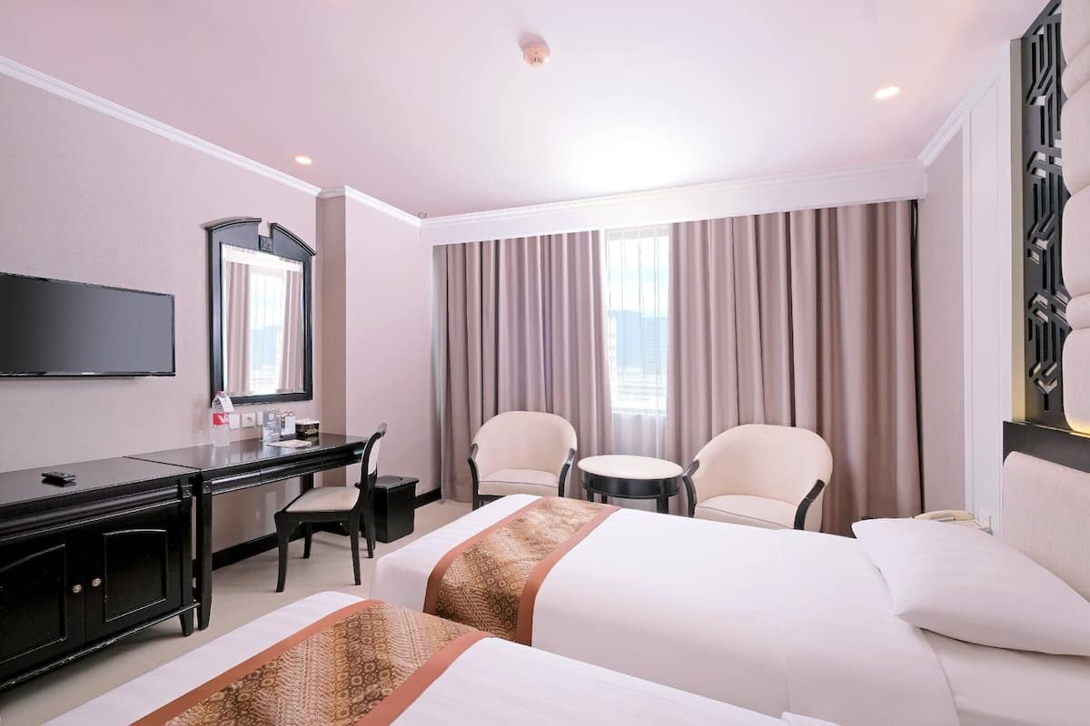 Kahden hengen deluxe-huone (kaksi sänkyä) (DELUXE TWIN NEW) | 1 makuuhuone, minibaari, työpöytä, äänieristys