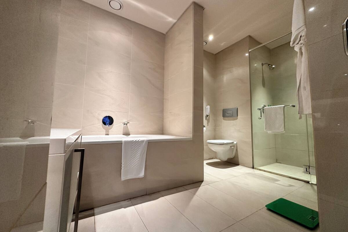 separate bathtub and shower, free toiletries, hair dryer, towels