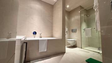 Separate bathtub and shower, free toiletries, hair dryer, towels