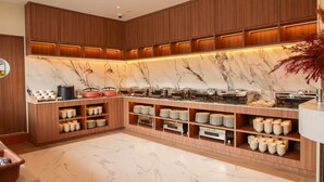 A modern kitchen with wooden cabinets, marble countertops, and a variety of food containers. - Days Inn by Wyndham Singapore Novena (Singapore)