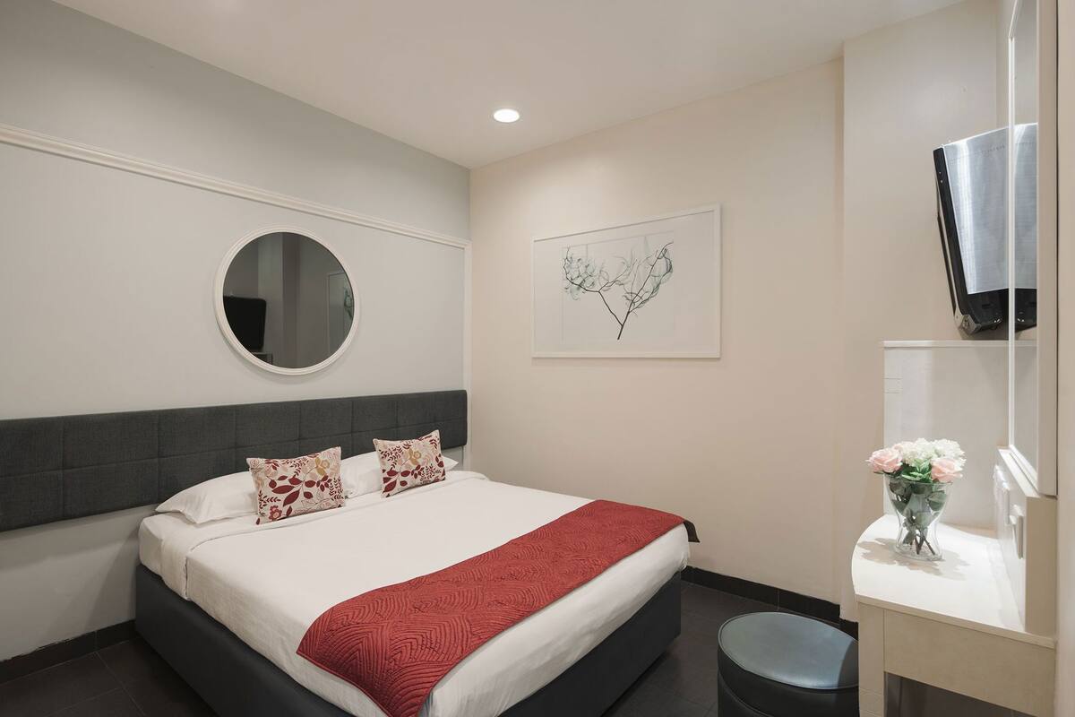 Premium bedding, desk, blackout drapes, iron/ironing board (on request)