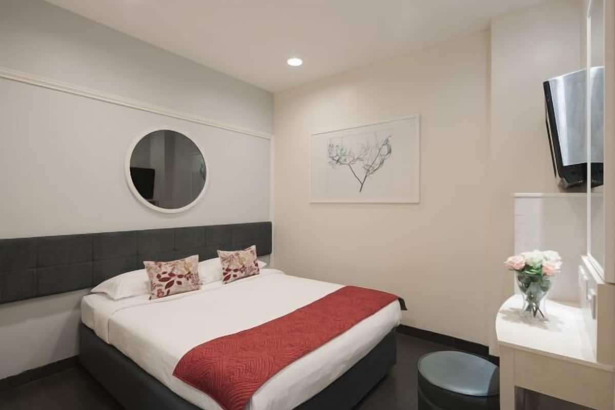 Premium bedding, desk, blackout curtains, iron/ironing board
