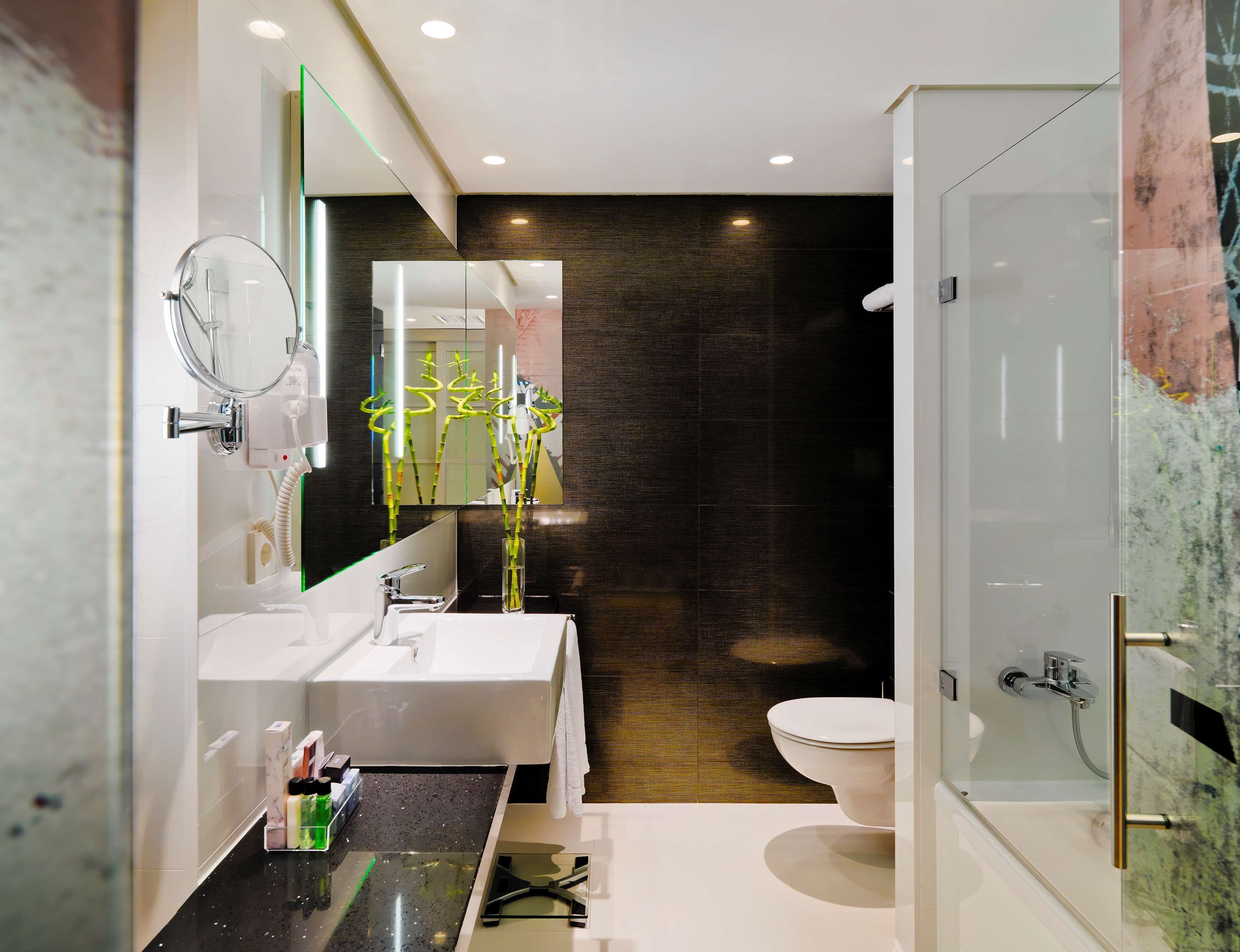 eco-friendly toiletries, hair dryer, towels, soap