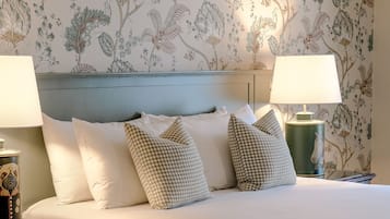 Premium bedding, individually furnished, blackout drapes