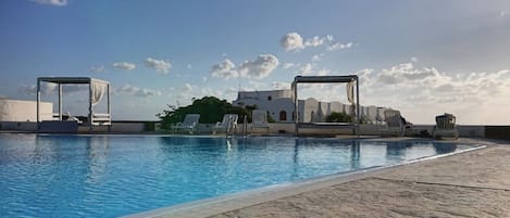 Seasonal outdoor pool, sun loungers