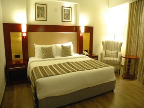 Ropa de cama de alta calidad y minibar