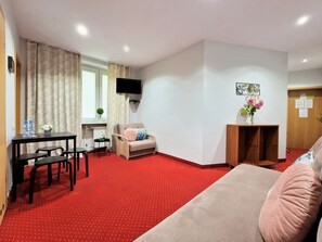 Standard Apartment, 1 Bedroom, Non Smoking, Kitchen | Living room | 24-inch LCD TV with digital channels, TV - Helvetia Plus (Warsaw)