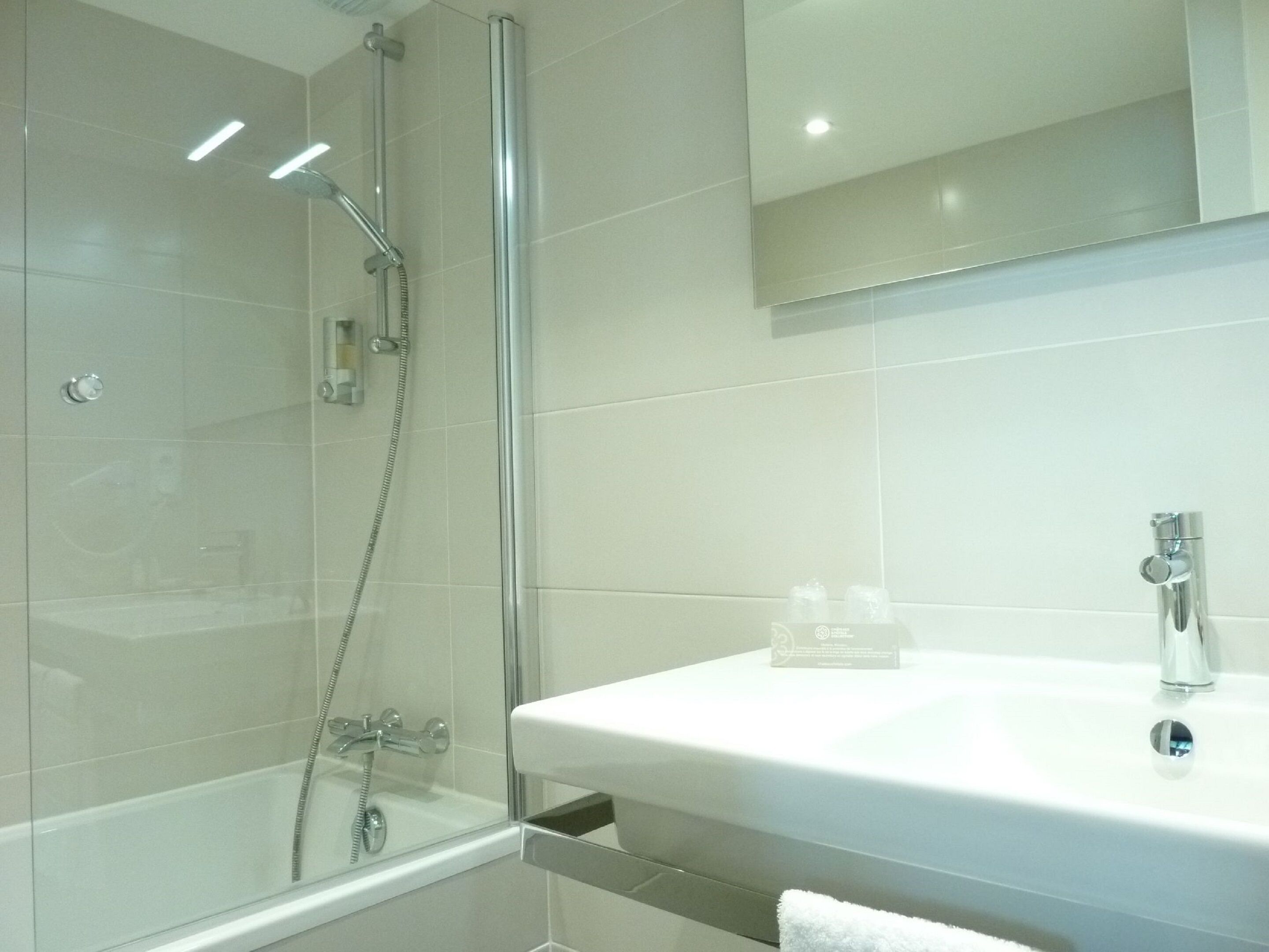 hair dryer, bathrobes, slippers, towels