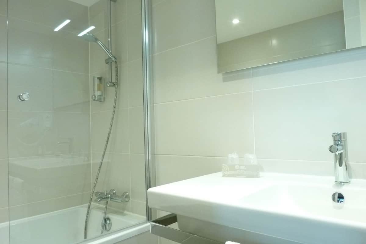 hair dryer, bathrobes, slippers, towels