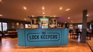 A bar area with a sign reading "The Lock Keepers". - The Mooringpost (Gloucester)