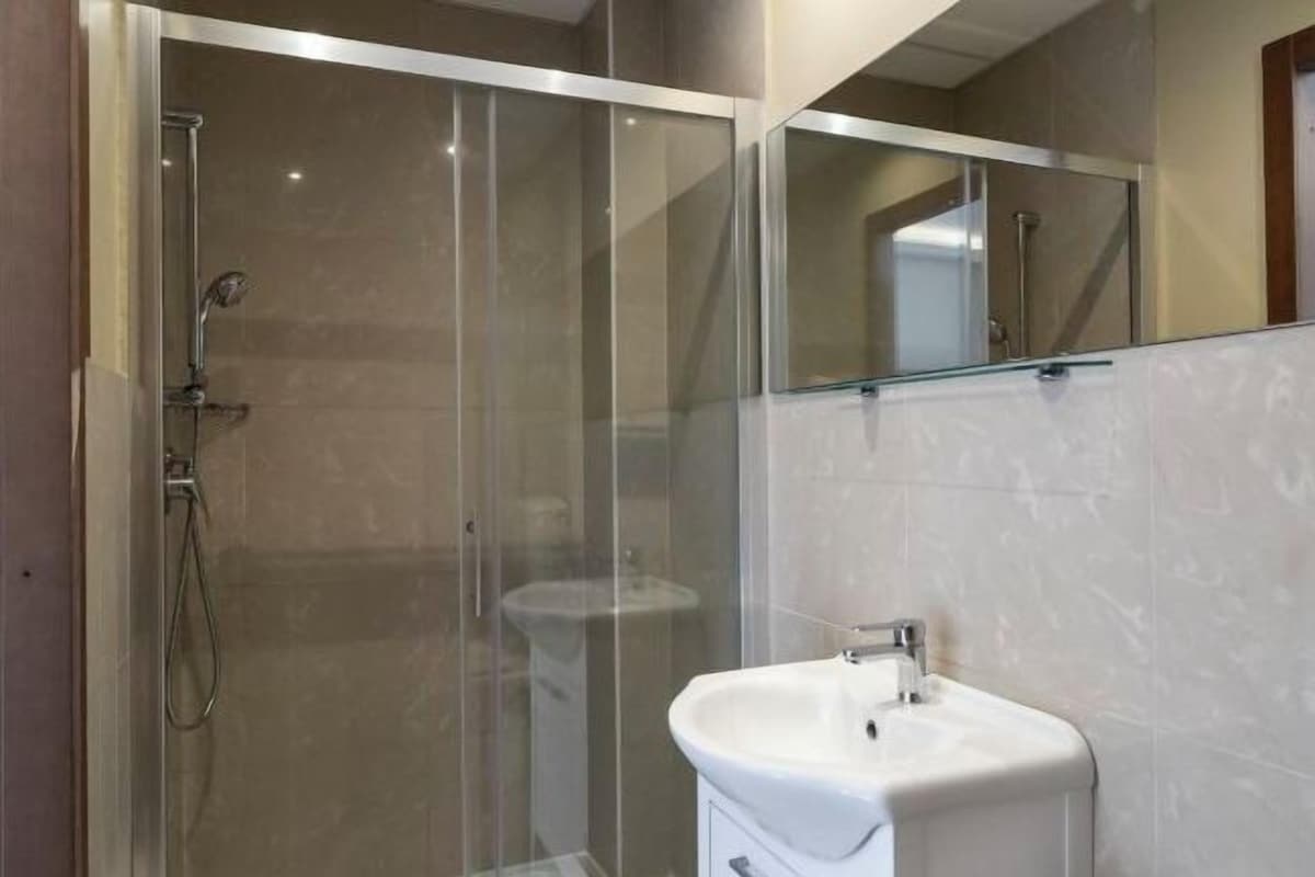 Shower, hair dryer (on request), towels, soap