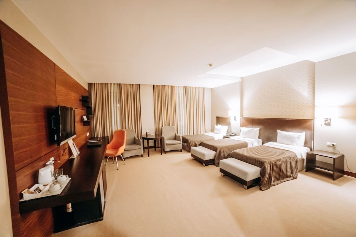 Superior Triple Room | Hypo-allergenic bedding available, minibar, in-room safe, desk