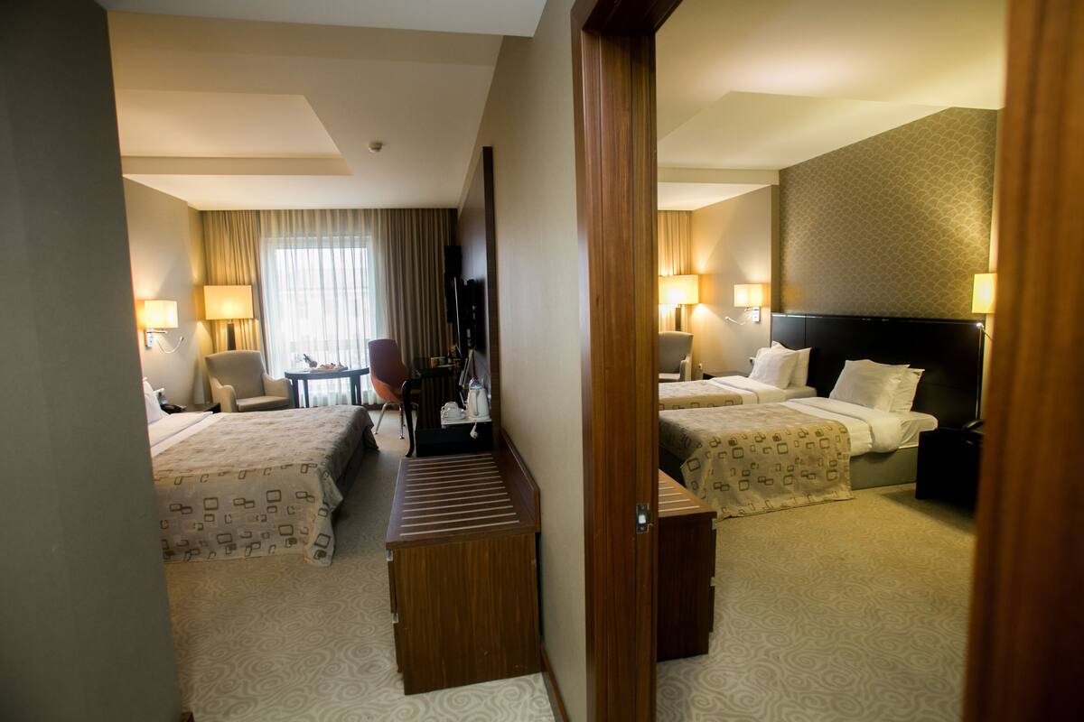 Family Room, 2 Bedrooms | Hypo-allergenic bedding available, minibar, in-room safe, desk