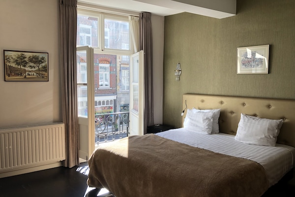 Superior Double Room | Minibar, in-room safe, iron/ironing board, rollaway beds