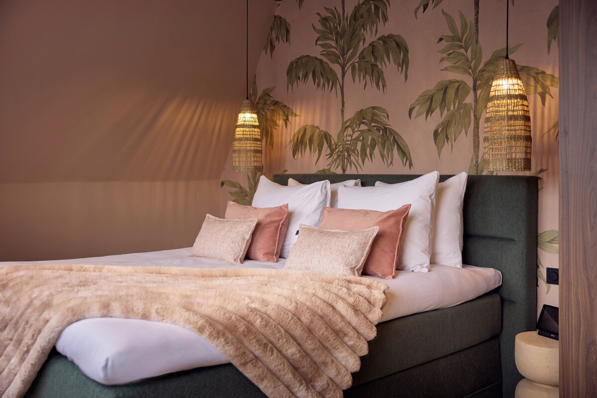 Suite | Minibar, blendingsgardiner, wi-fi (inkludert) og sengetøy