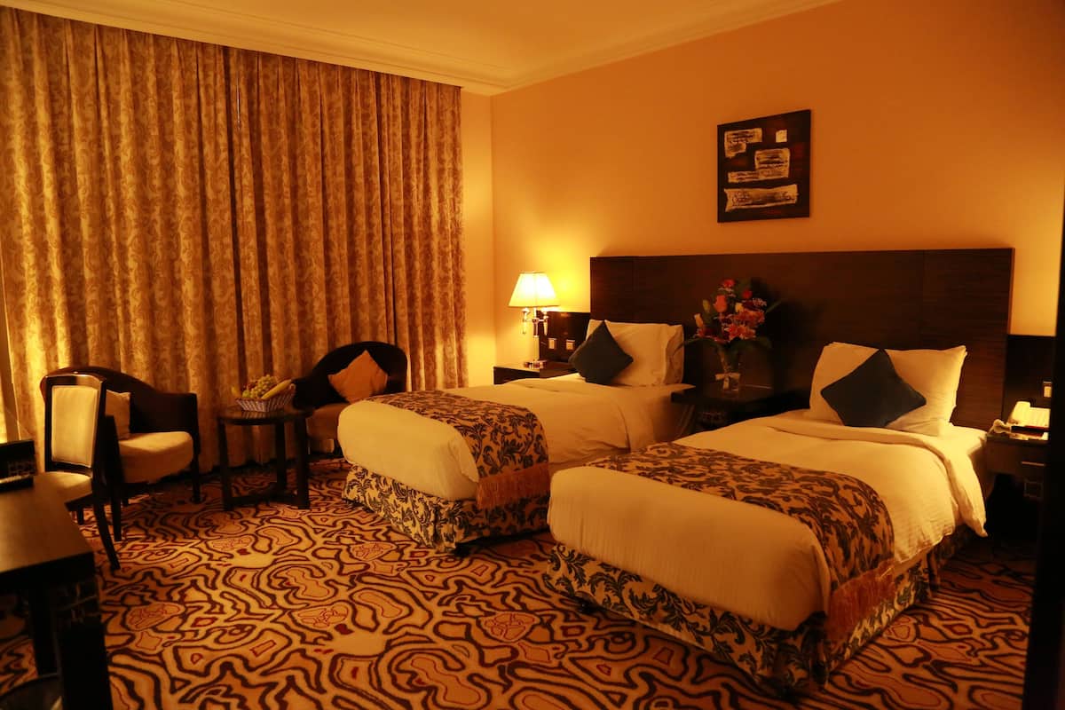 Lakens van Egyptisch katoen, luxe beddengoed, een minibar