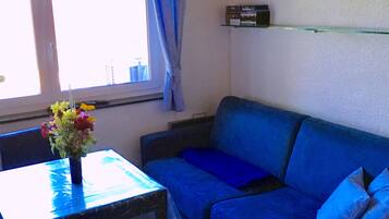 Maison Confort, coin cuisine | Salle de séjour