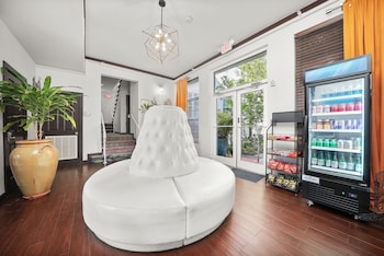 Sitting area in hotel lobby at Tradewinds Apartment Hotel