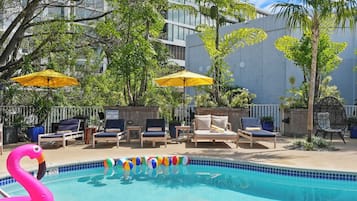 Outdoor pool, free pool cabanas, pool umbrellas