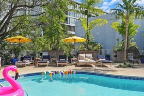 Outdoor pool, free cabanas, pool umbrellas