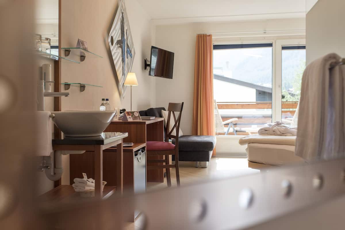 Hypoallergeen beddengoed, een gratis minibar, een kluis op de kamer