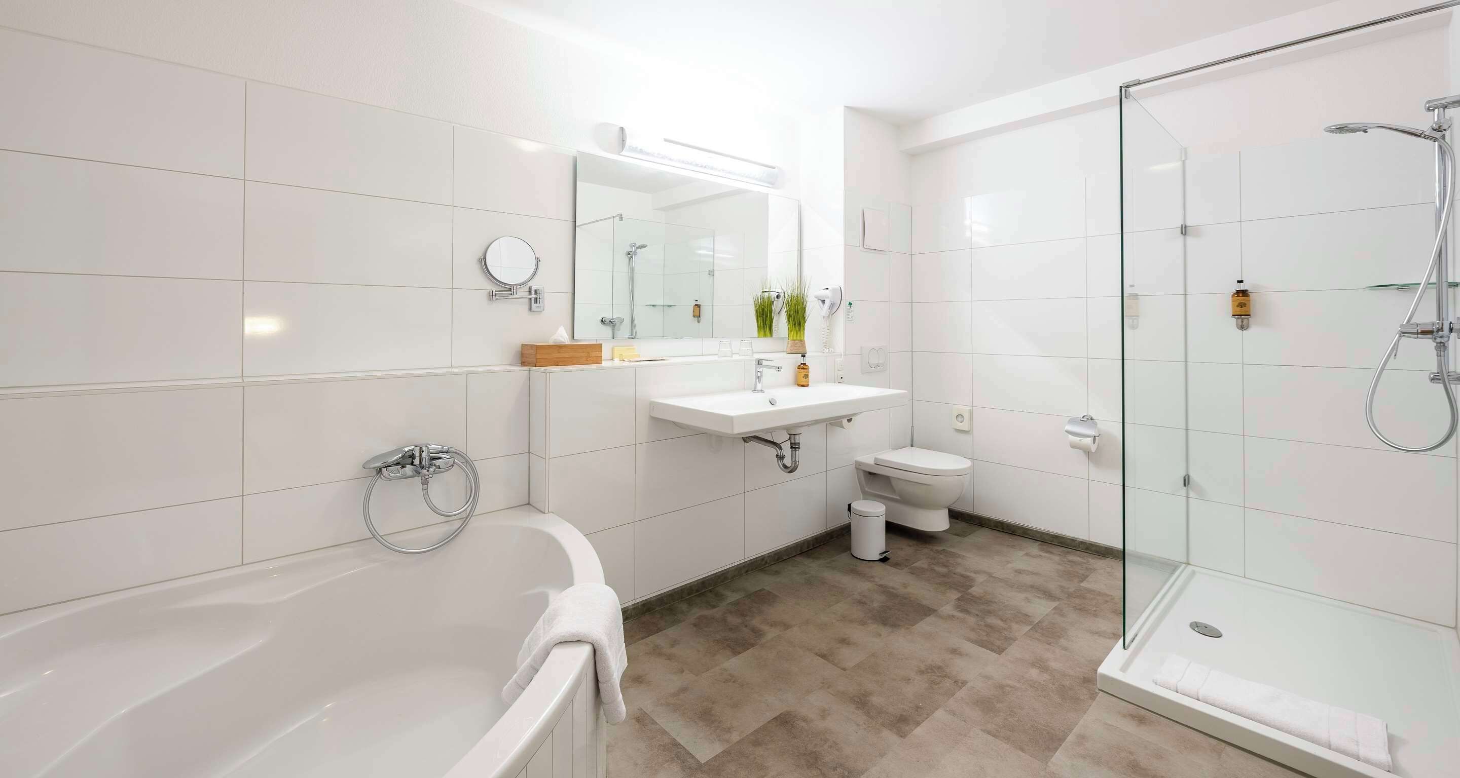 suite, 1 queen bed | bathroom | rainfall showerhead, free toiletries, hair dryer, towels