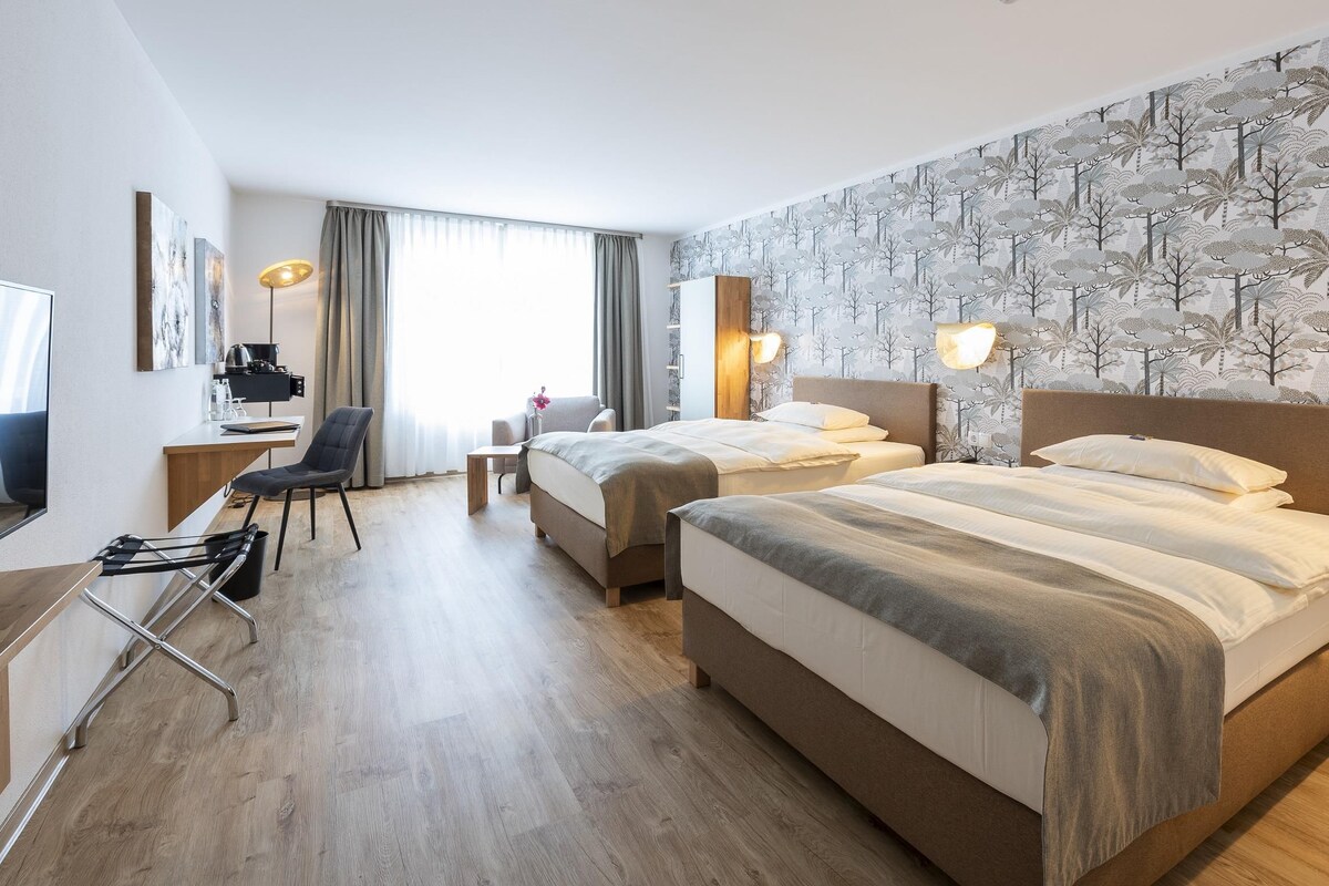 Standard Room, 2 Queen Beds | In-room safe, desk, laptop workspace, blackout drapes