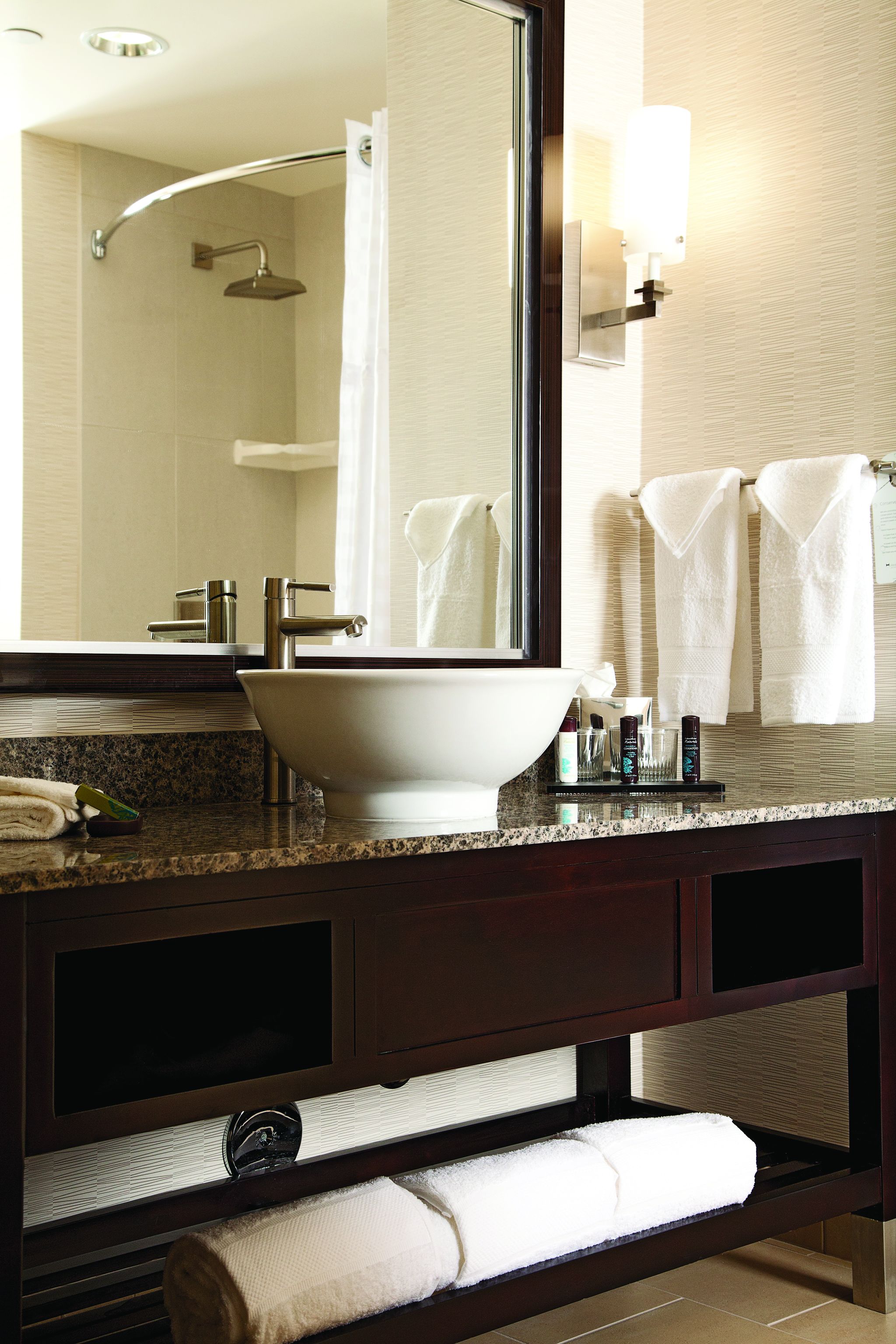 rainfall showerhead, designer toiletries, hair dryer, towels