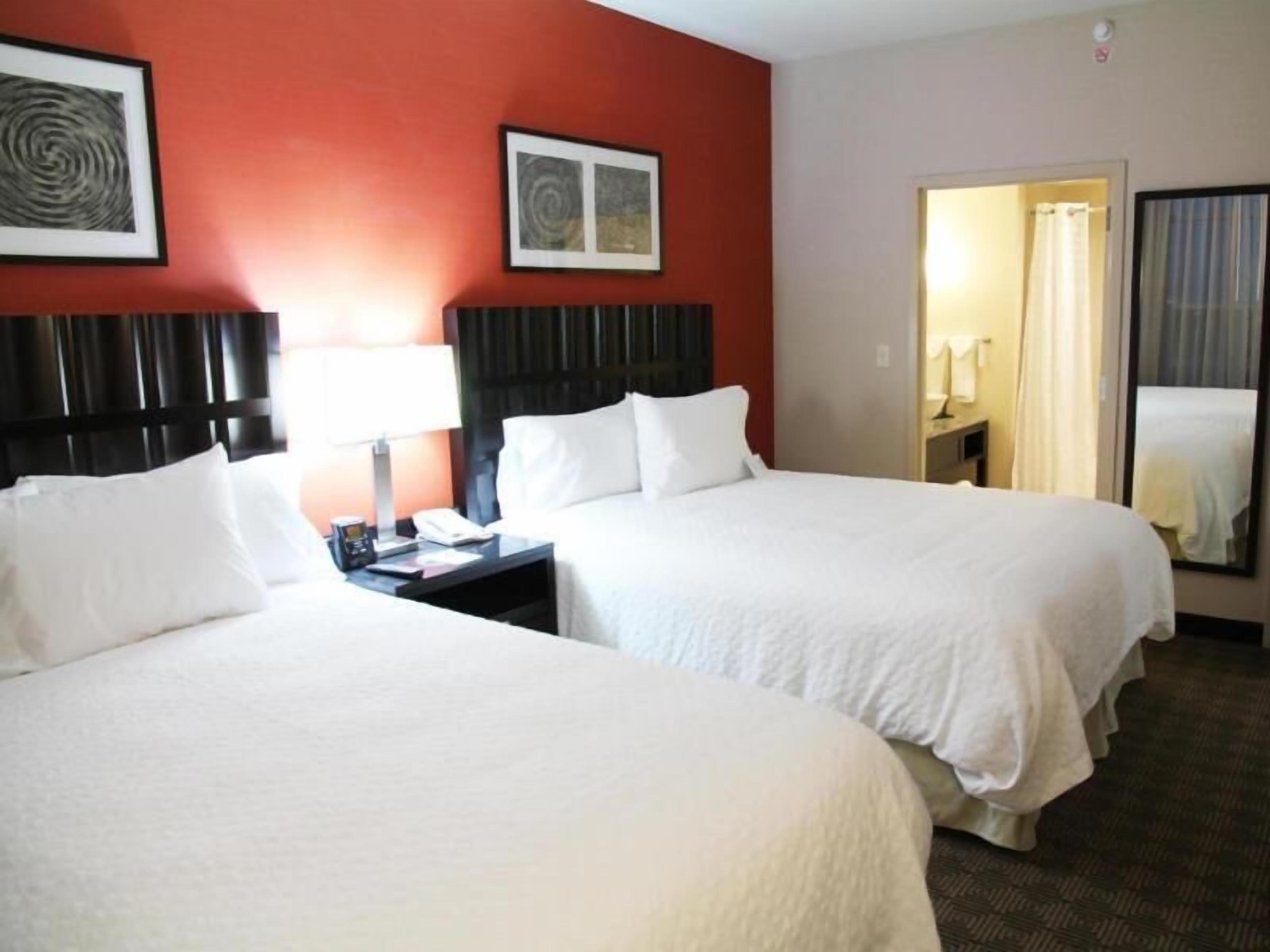 Hypo-allergenic bedding, down duvets, in-room safe