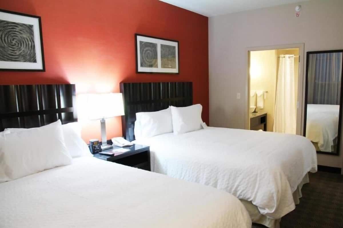 Hypo-allergenic bedding, down duvets, in-room safe