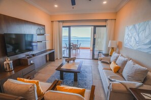 Two Bedroom Penthouse Oceanfront | Living area | 42-inch LED TV with satellite channels, TV, iPod dock - Villa del Palmar at the Islands of Loreto (Loreto)