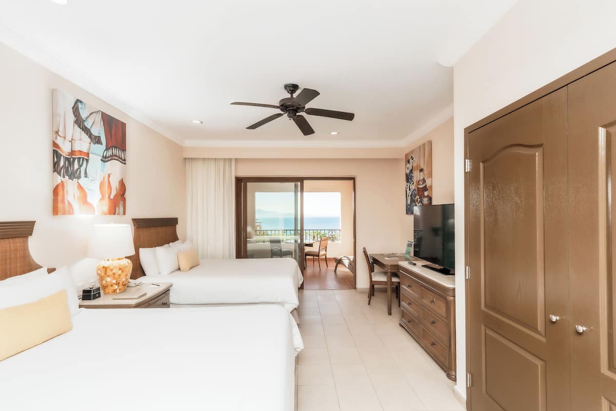 Deluxe Suite, Ocean View | Premium bedding, down comforters, in-room safe, desk