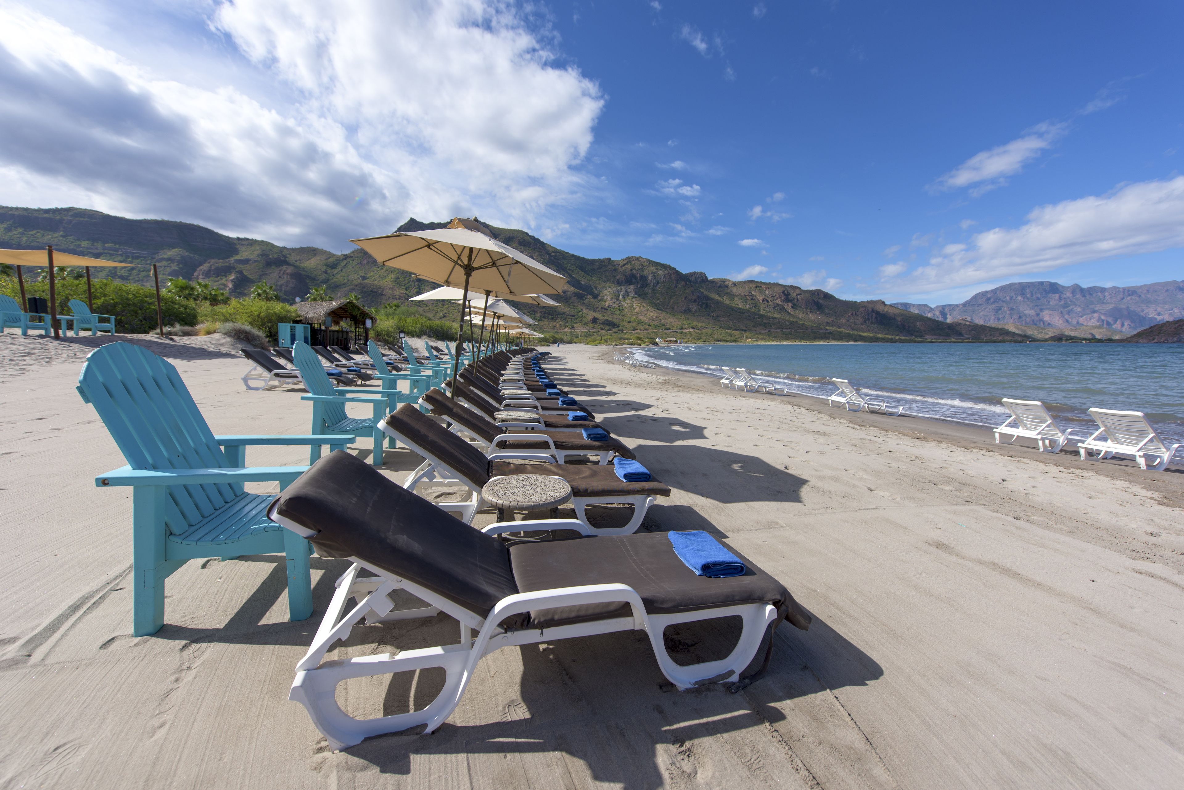 private beach, sun-loungers, beach umbrellas, beach towels
