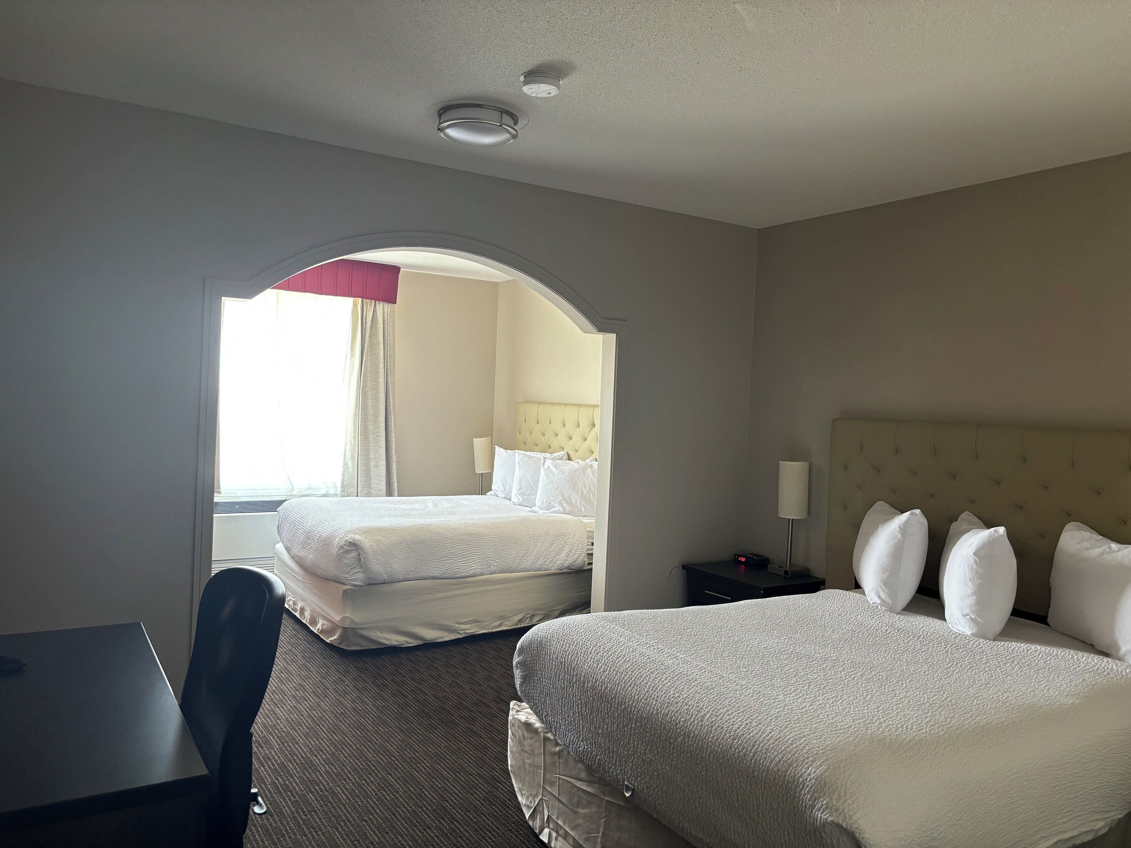 Premium bedding, down duvets, pillow-top beds, blackout curtains