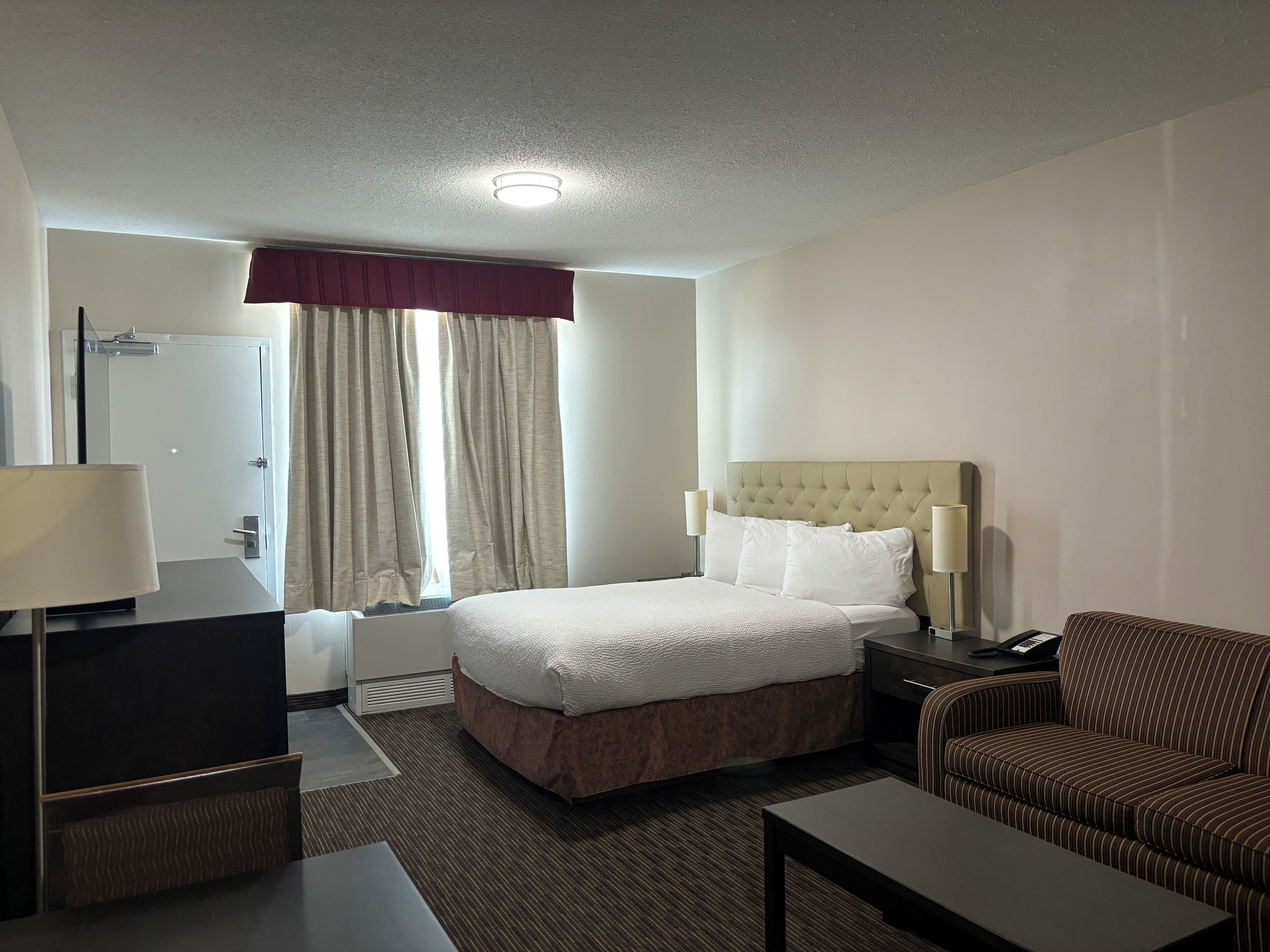 Premium bedding, down duvets, pillow-top beds, blackout curtains