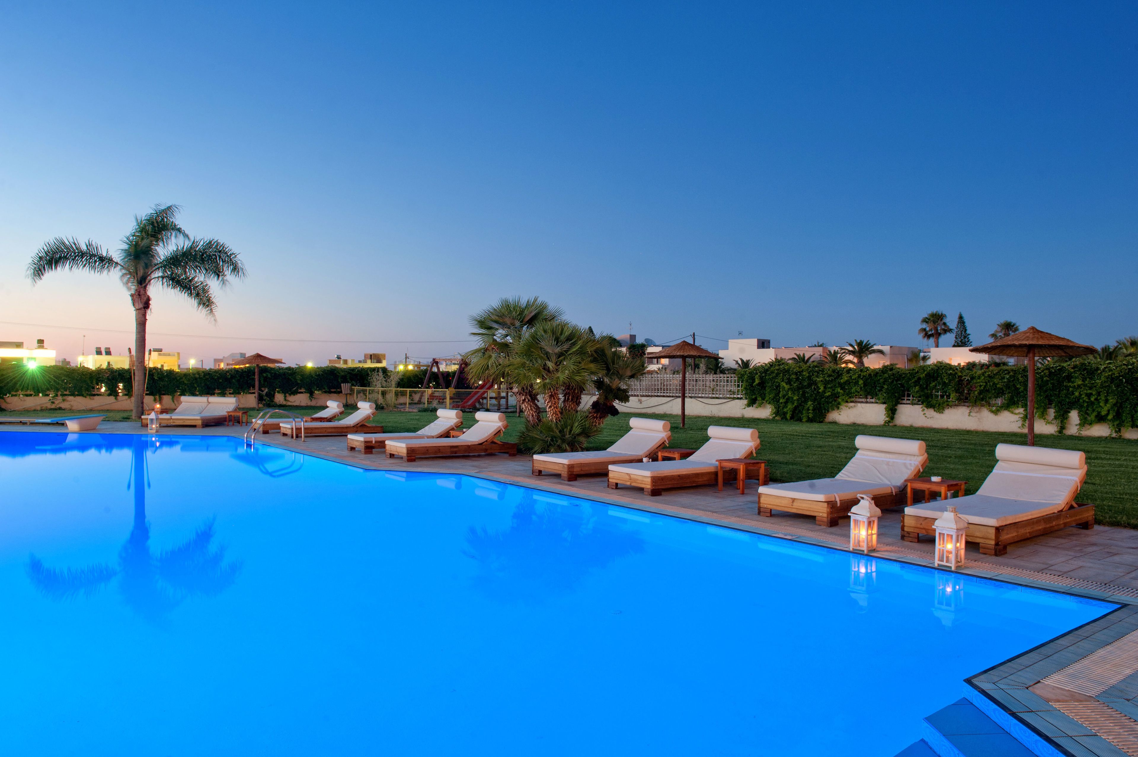 Seasonal outdoor pool, pool umbrellas, sun loungers