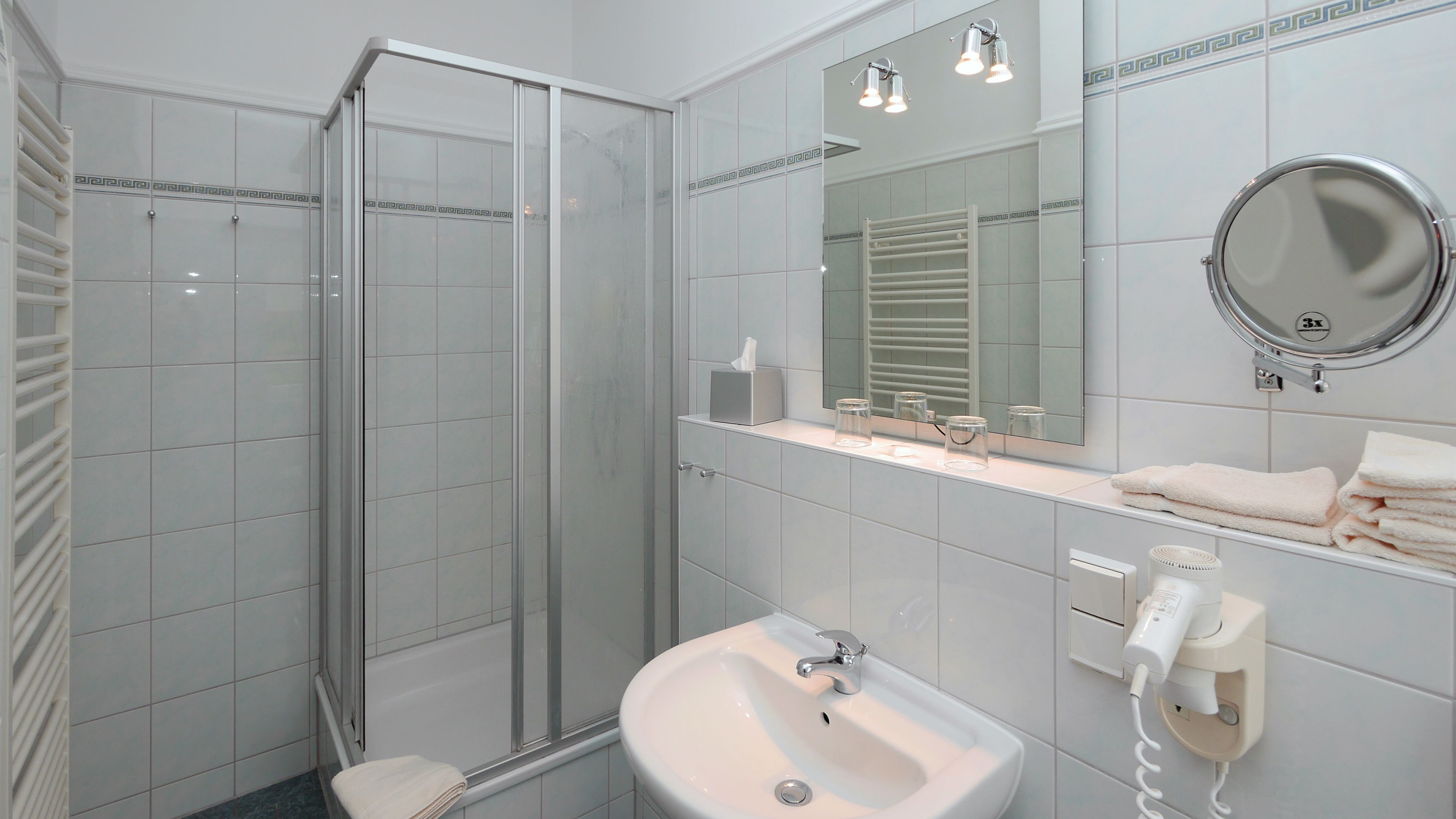 suite | bathroom | shower, hair dryer, towels