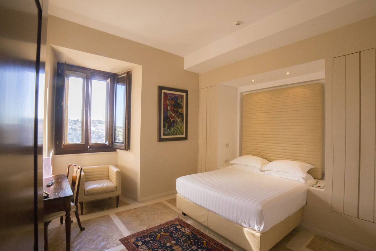 premium bedding, down duvets, pillow-top beds, minibar