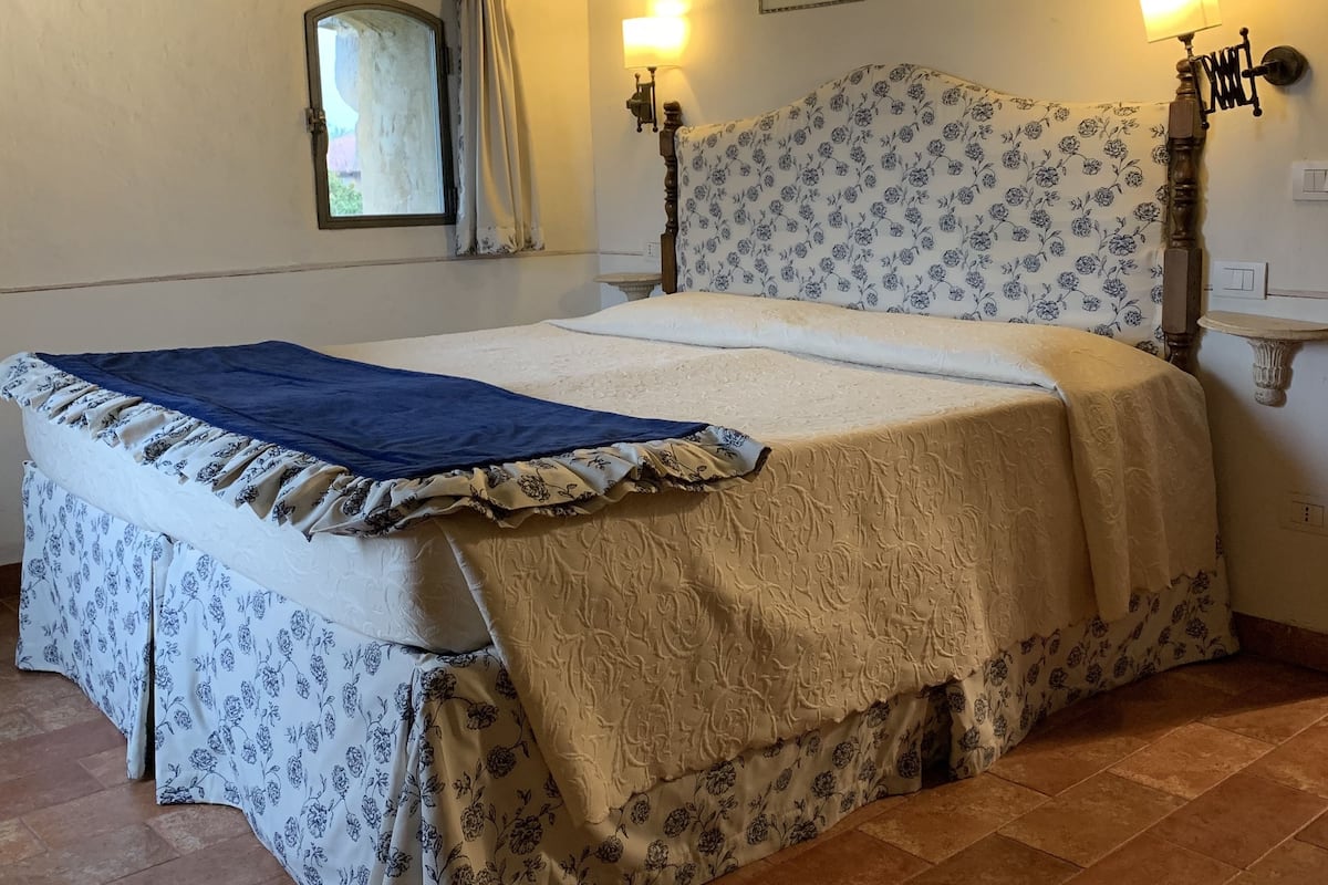 Suite per 4 persone | Minibar, una cassaforte in camera, una scrivania, ferro/asse da stiro