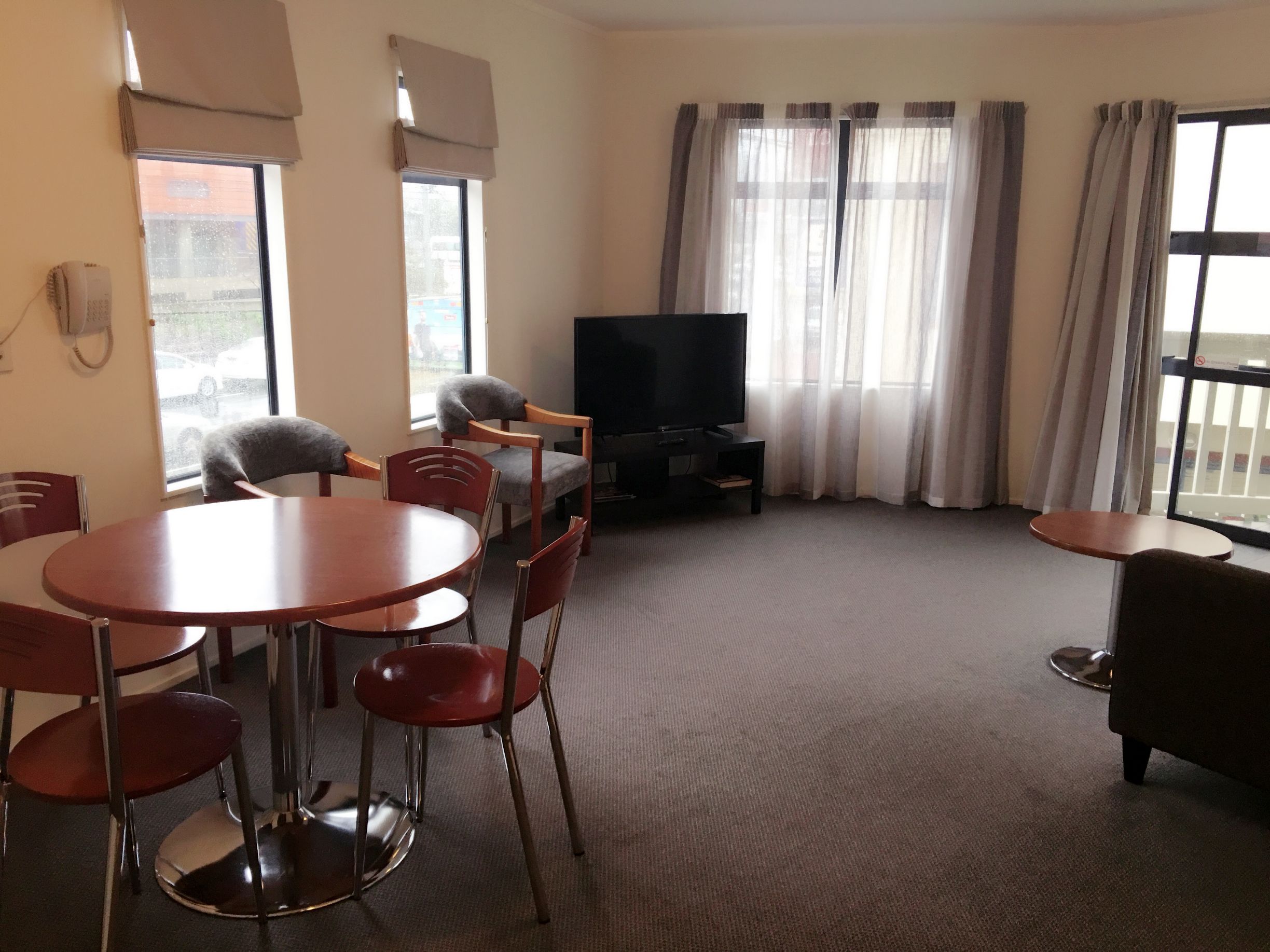 1 bedroom suite | living area | flat-screen tv